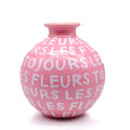 Pink Round Vase with White Lettering